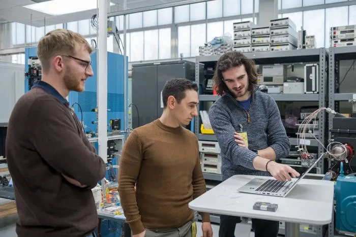 University of Leicester team members supporting the integration and testing activities of the Am-RSG at NASA Glenn