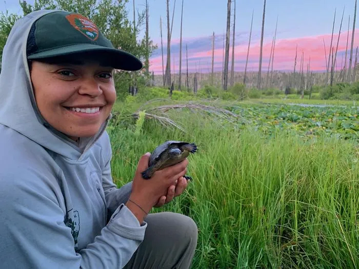 Sidney Woodruff with pond turtle