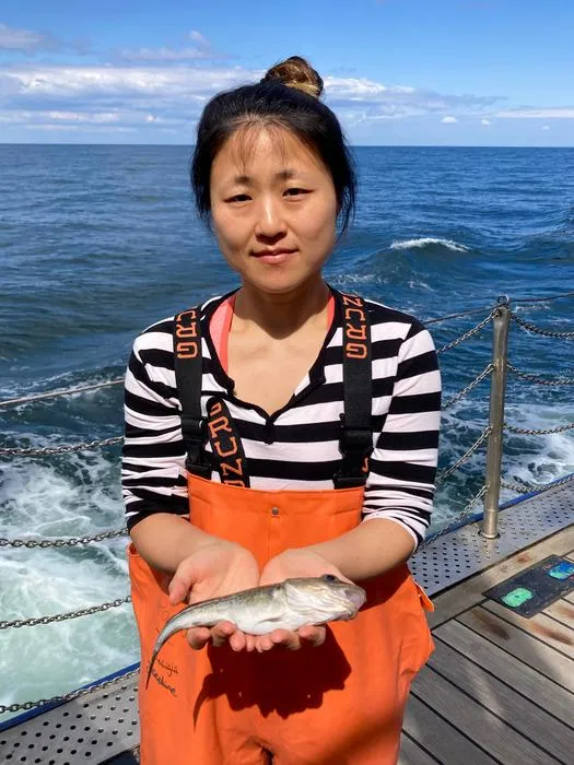 Dr Kwi Young Han with cod