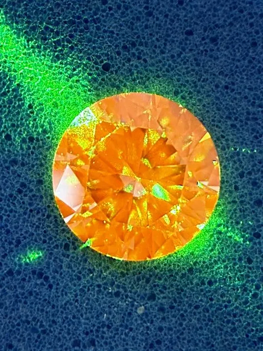 Diamond containing NV colour centres on a blue background (2)