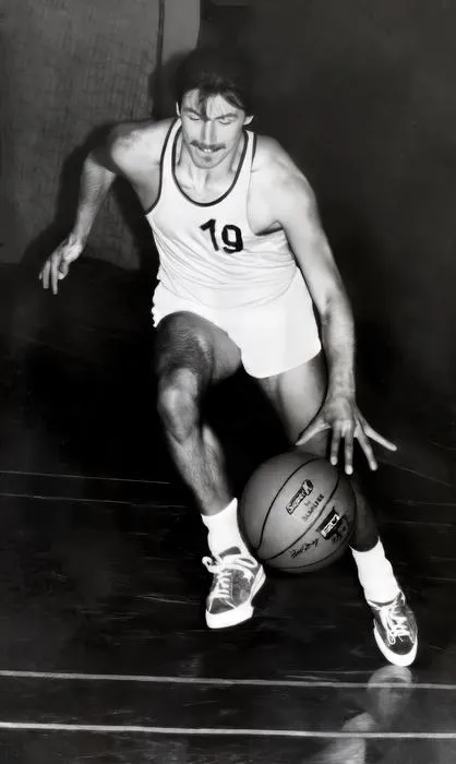 Siegfried Kasper in his youth as a point guard for an Austrian second division basketball team, wearing jersey #19.