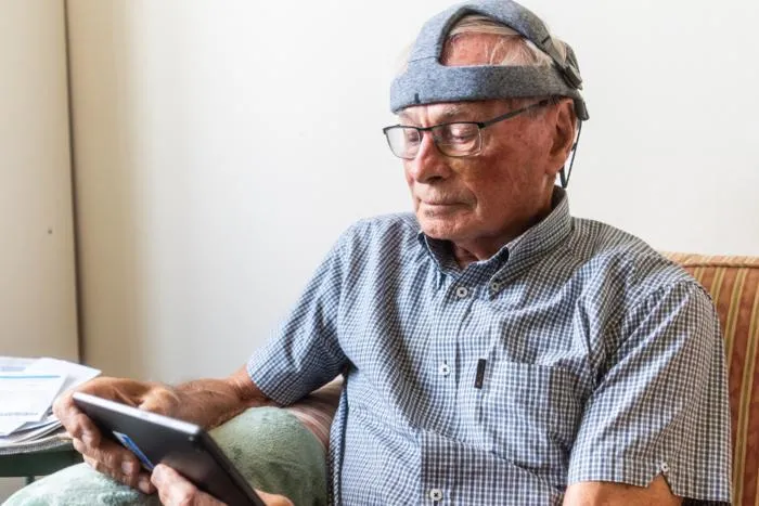 Study volunteer taking the Fastball test in his home