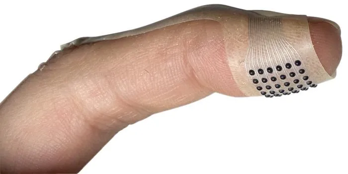 VoxeLite on a fingertip