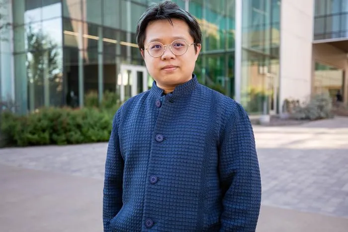 Dr. Liang He