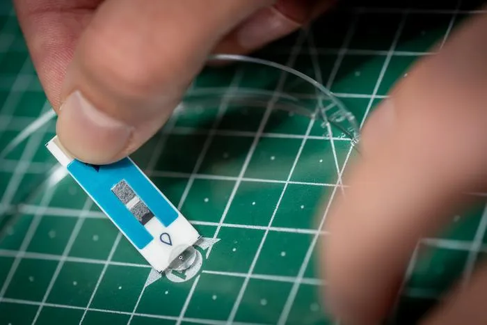 The sensor strip is treated with a sample