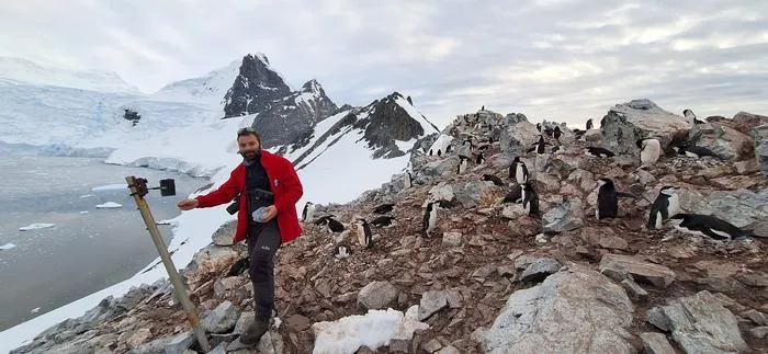 Ignacio Juarez with Chinstrap colony