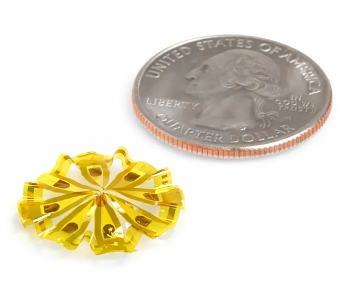 Full device next to quarter for scale