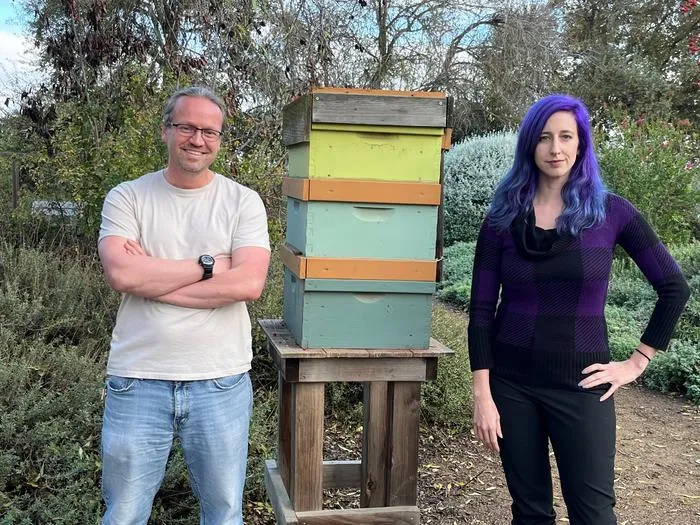 Sascha Nicklisch and Julia Fine with bee box