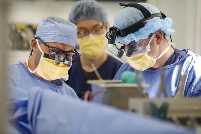 The Neurosurgical Team at the University of Rochester works together during an awake craniotomy for brain tumor resection.