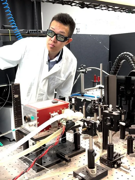 Mingyi Liu at the laser lab