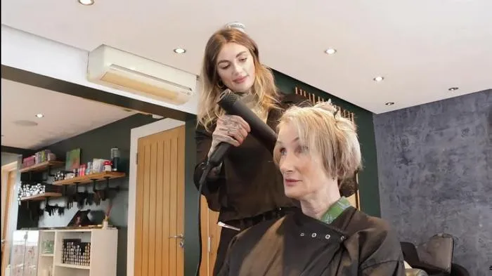 Hair stylist Harriet Barber of B Hairdressing, Bath, with a client