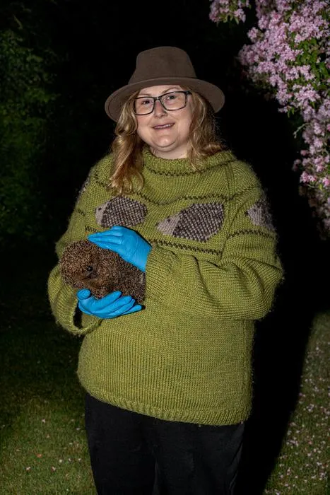 Dr Sophie Lund Rasmussen (aka Dr Hedgehog) with a European hedgehog