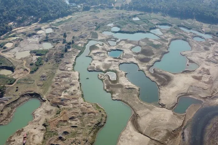 Gravel mining in the Lubha River, Northeast Bangladesh.