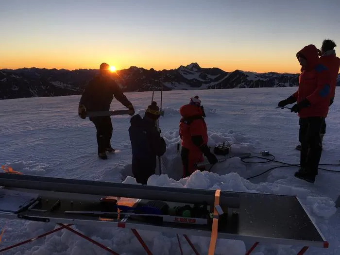 Researchers drill an ice core at Weißseespitze, Ötztal Alps, in 2018