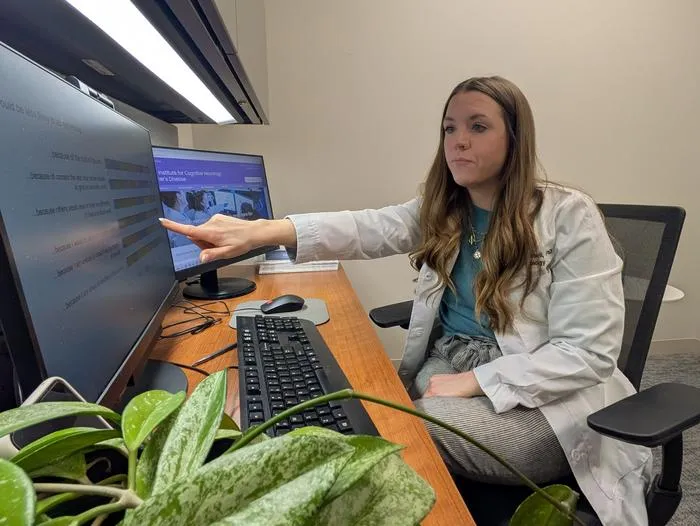 Study senior author Andrea Russell looking at research data in her office at Northwestern Memorial Hospital in Chicago