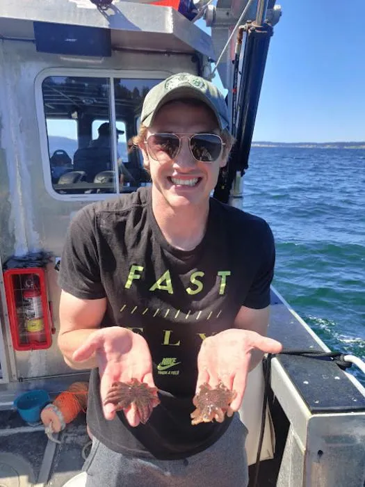 Andrew McCracken with sea stars