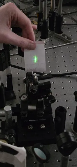 Light beam being shone onto the film