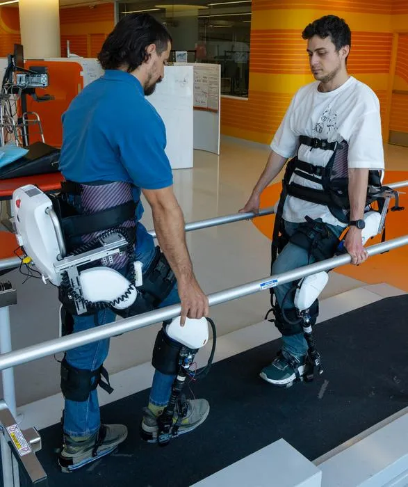 Therapist-exoskeleton-patient interaction