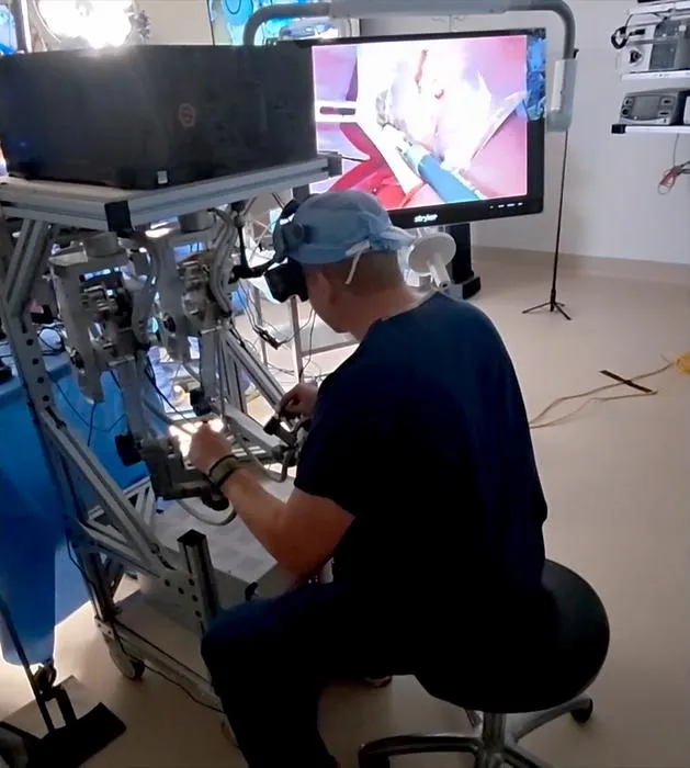 Surgeon at teleoperation console