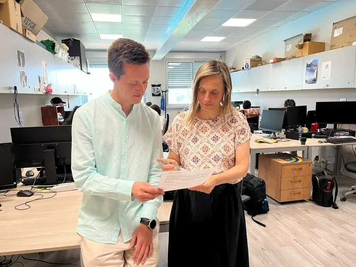Mattia Corti and Paola Antonietti in their office