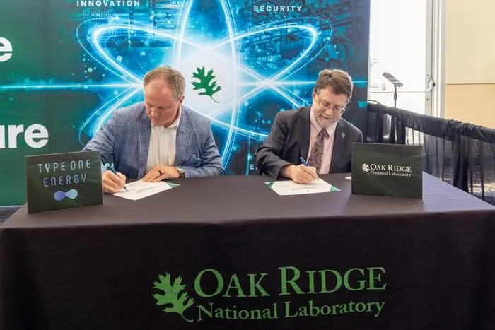 Stephen Streiffer and Matt Miles signing ceremony