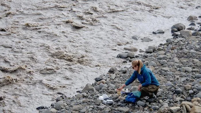 Dr Gabrielle Kleber taking Svalbard water samples