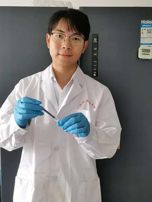 Dr Huang Min