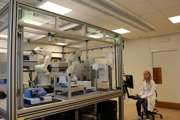 Ievgeniia Tiukova and the Robot scientist Eve