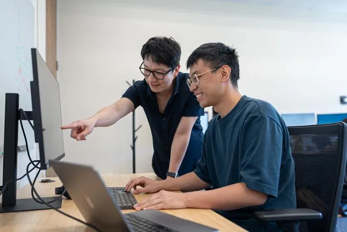 Sunghoon Ivan Lee and Ryan Wang in the lab